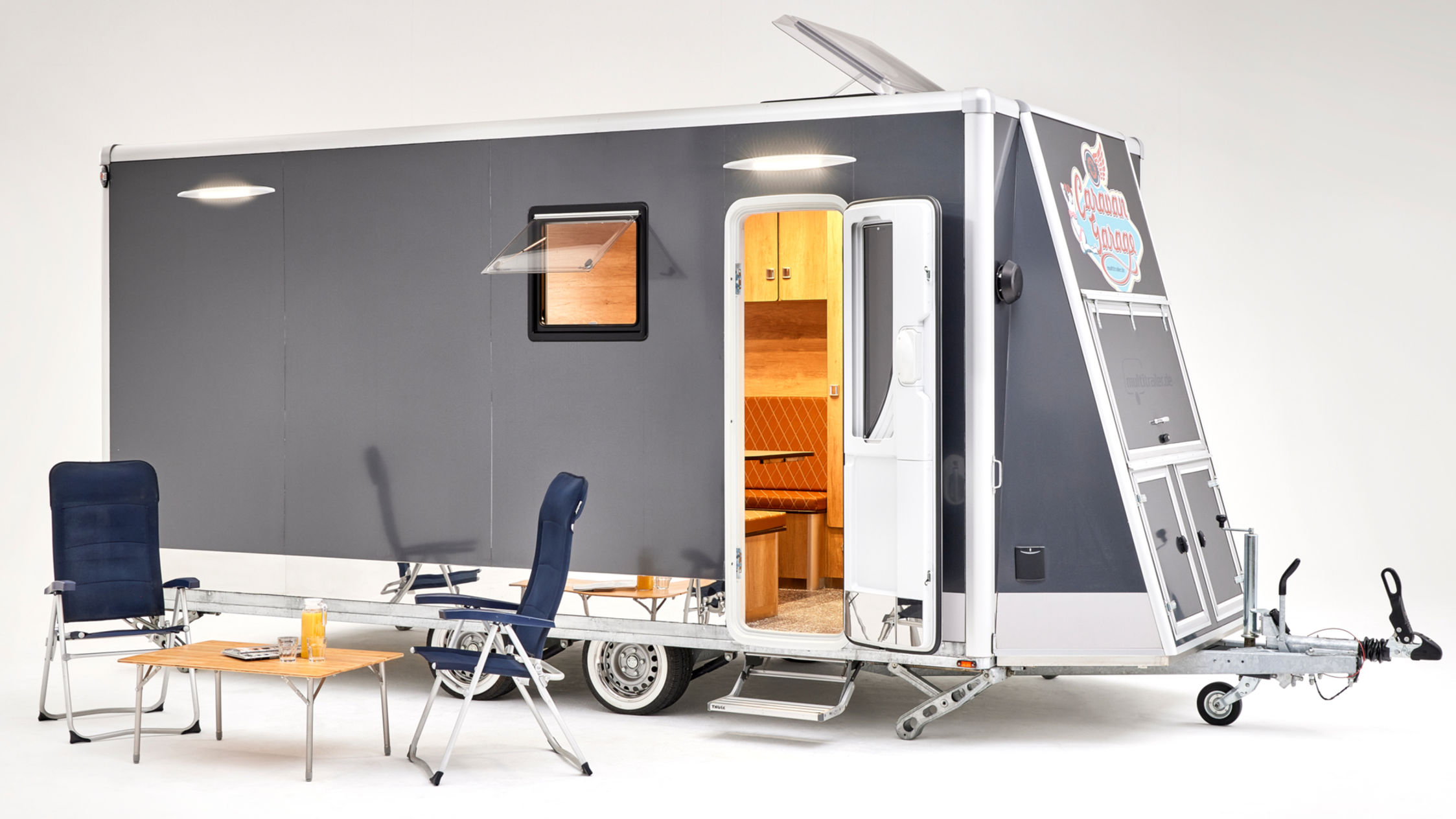 Caravan+Garage - innovativer Camping und Sportanhänger mit großen Abstellraum für Motorrad oder Ebike